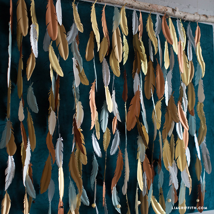 Make a Paper Feather Backdrop DIY Photo Backdrop